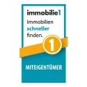 Logo von Immobilien1 mit dem Text 'Immobilien schneller finden' und dem Hinweis 'Miteigentümer'.